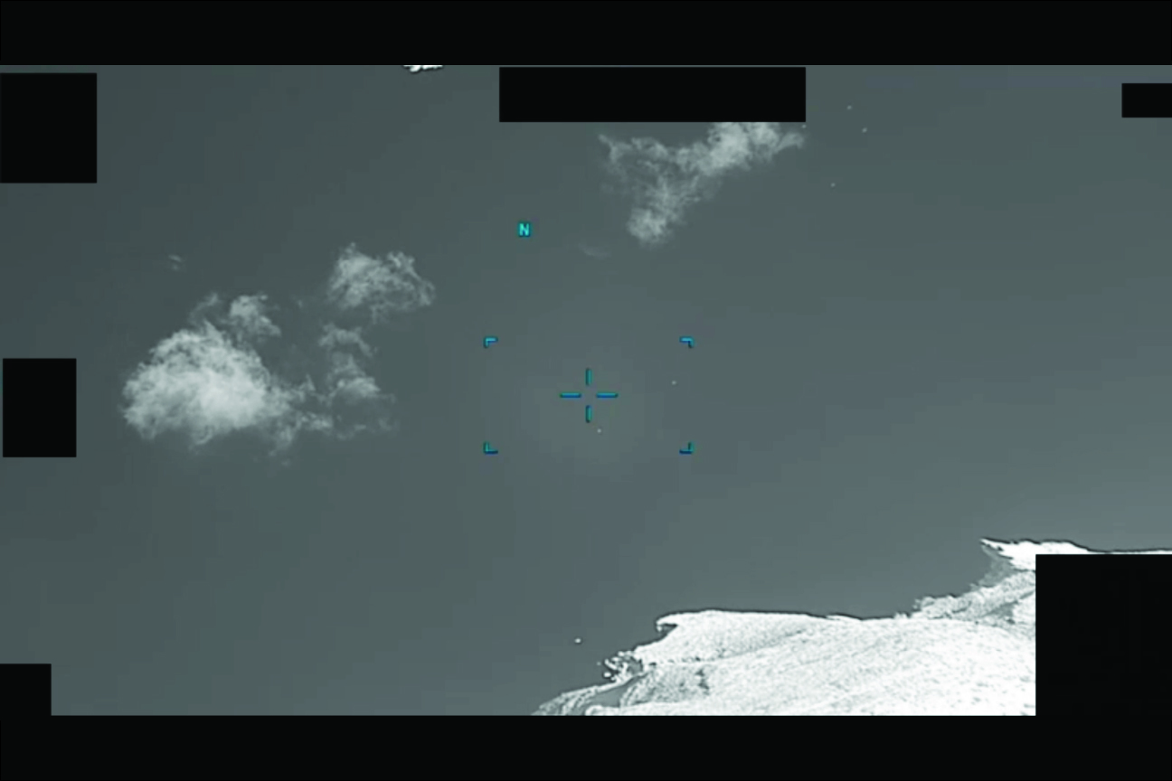 A U.S. military operator reported UAP near Greece flying straight above the ocean towards land.